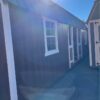 Preowned 12’x28’ Lofted Barn w/ Center Porch, 2 Lofts, 2 Windows, Stained & Metal Roof - Image 5
